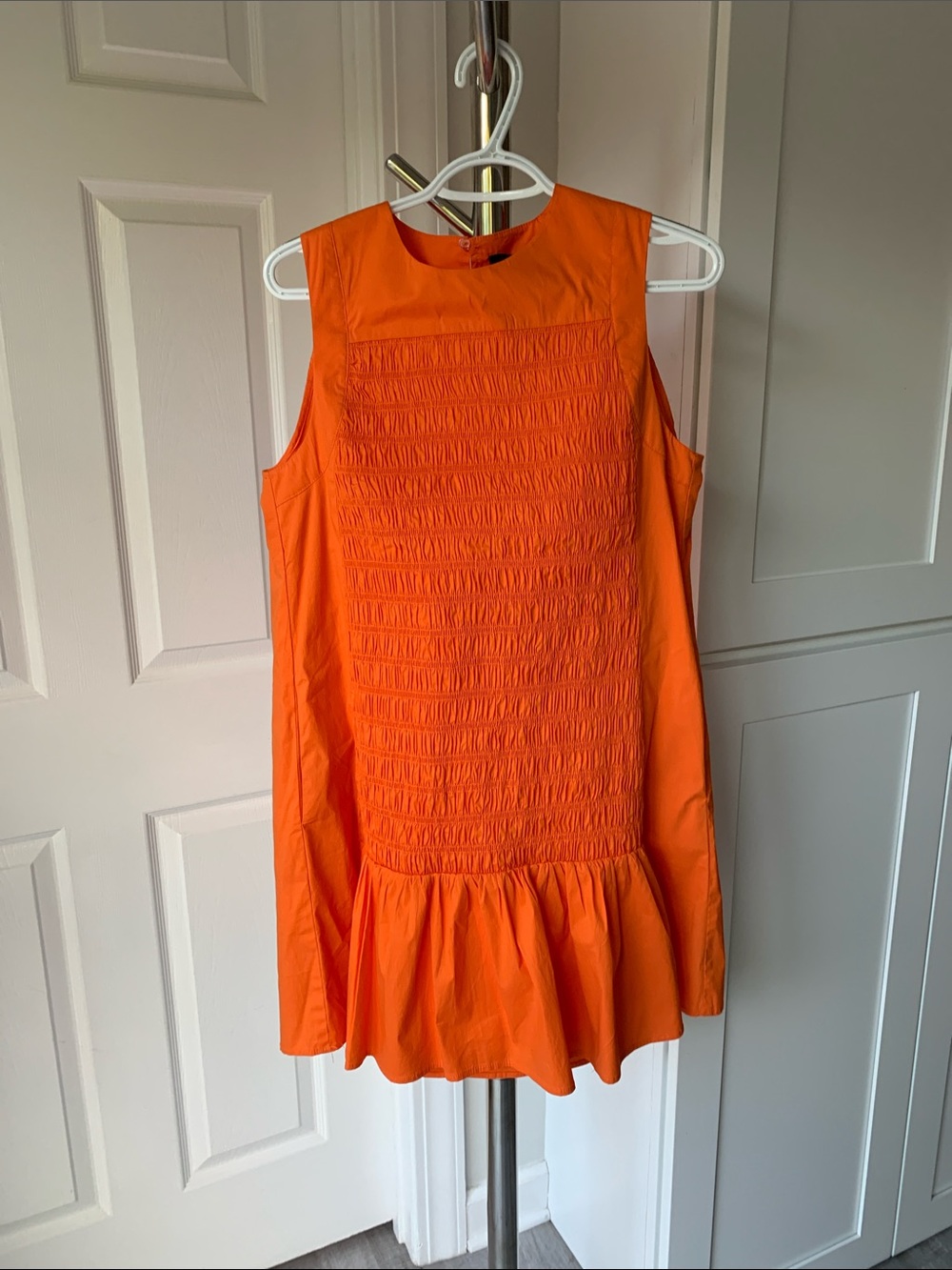 Strut and Bolt Sleeveless Orange Smocked Ruffle-Hem Dress, Size M.